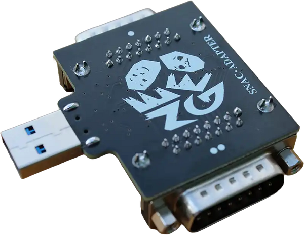 Black USB-to-serial adapter with a skull logo design.